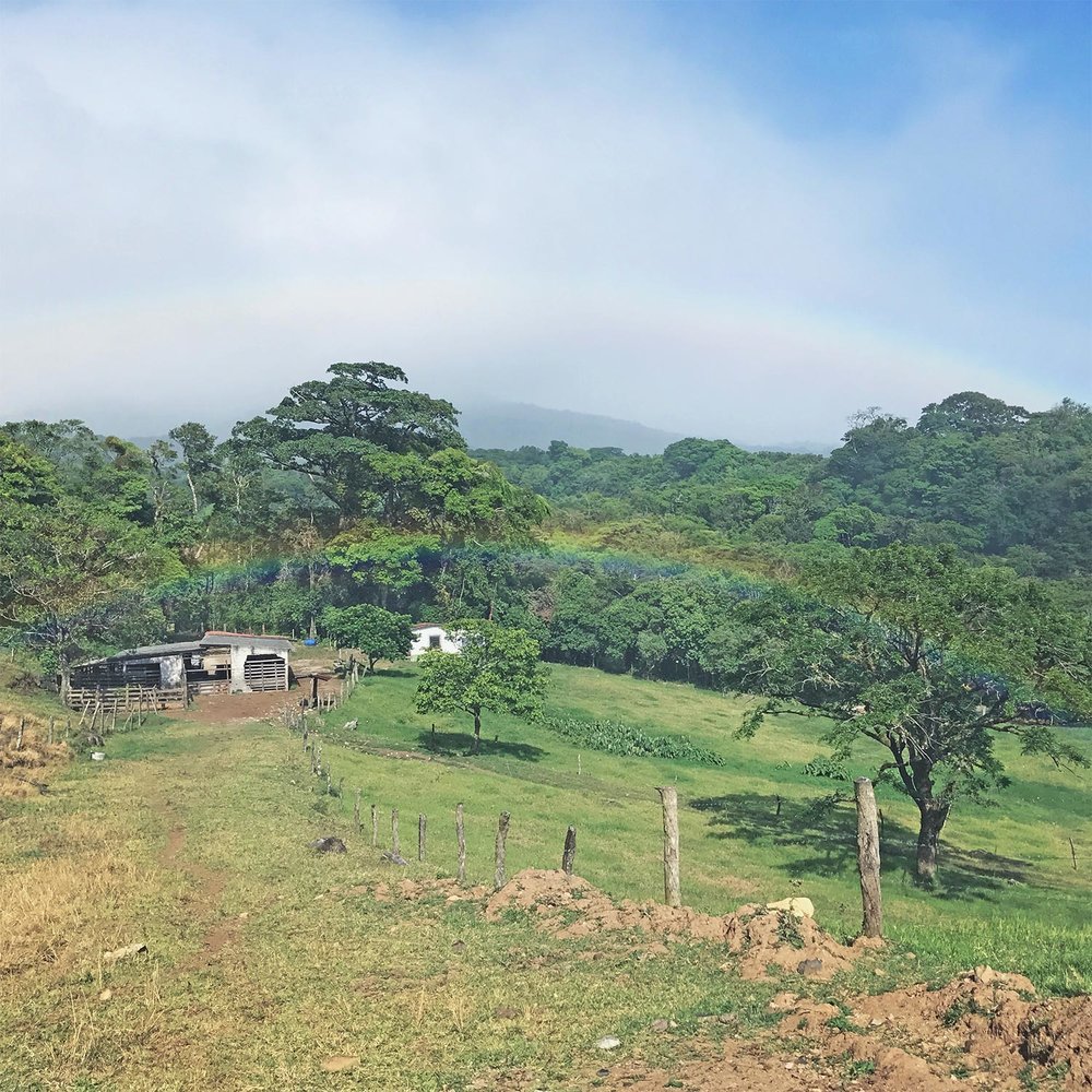 DOuble Rainbow at the end of ziplining in costa rica