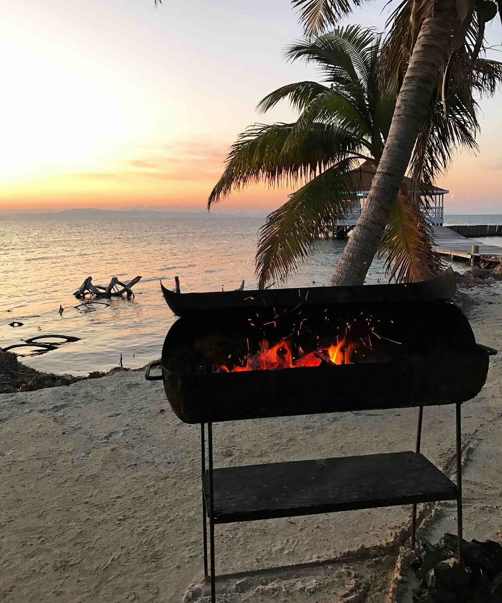 sunset lobster BBQ while sailing in Belize