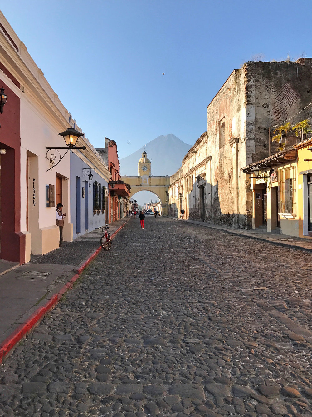 cobbled streets and volcano in Antigua Guatemala