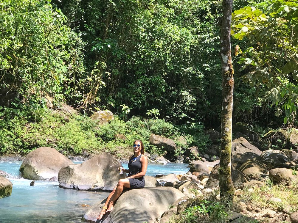 sapphire &amp; elm co-founder stephanie enjoying a local beer and day on rio celeste