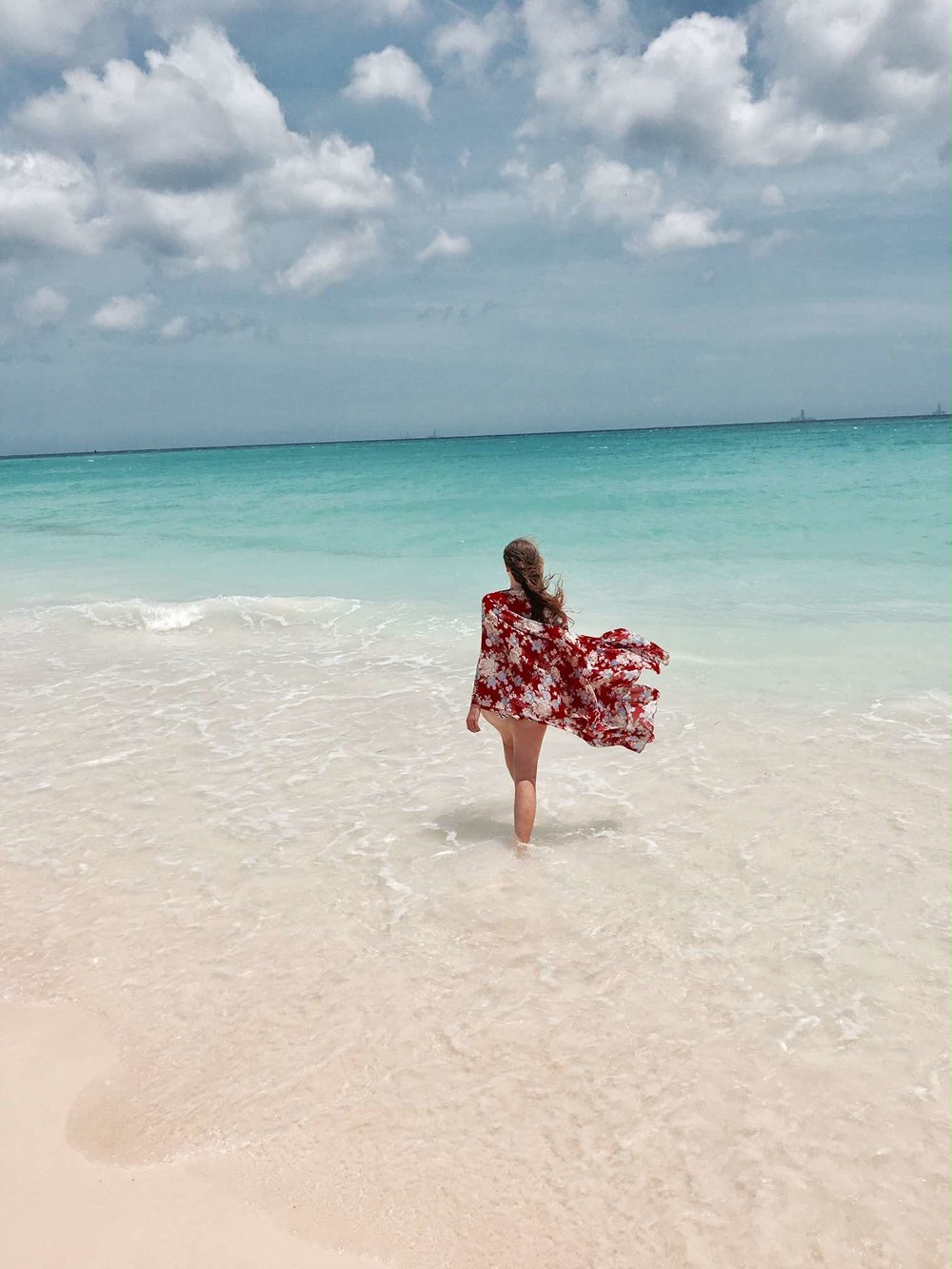 Sapphire &amp; Elm Travel co-founder   Carly   enjoying Aruba's beaches