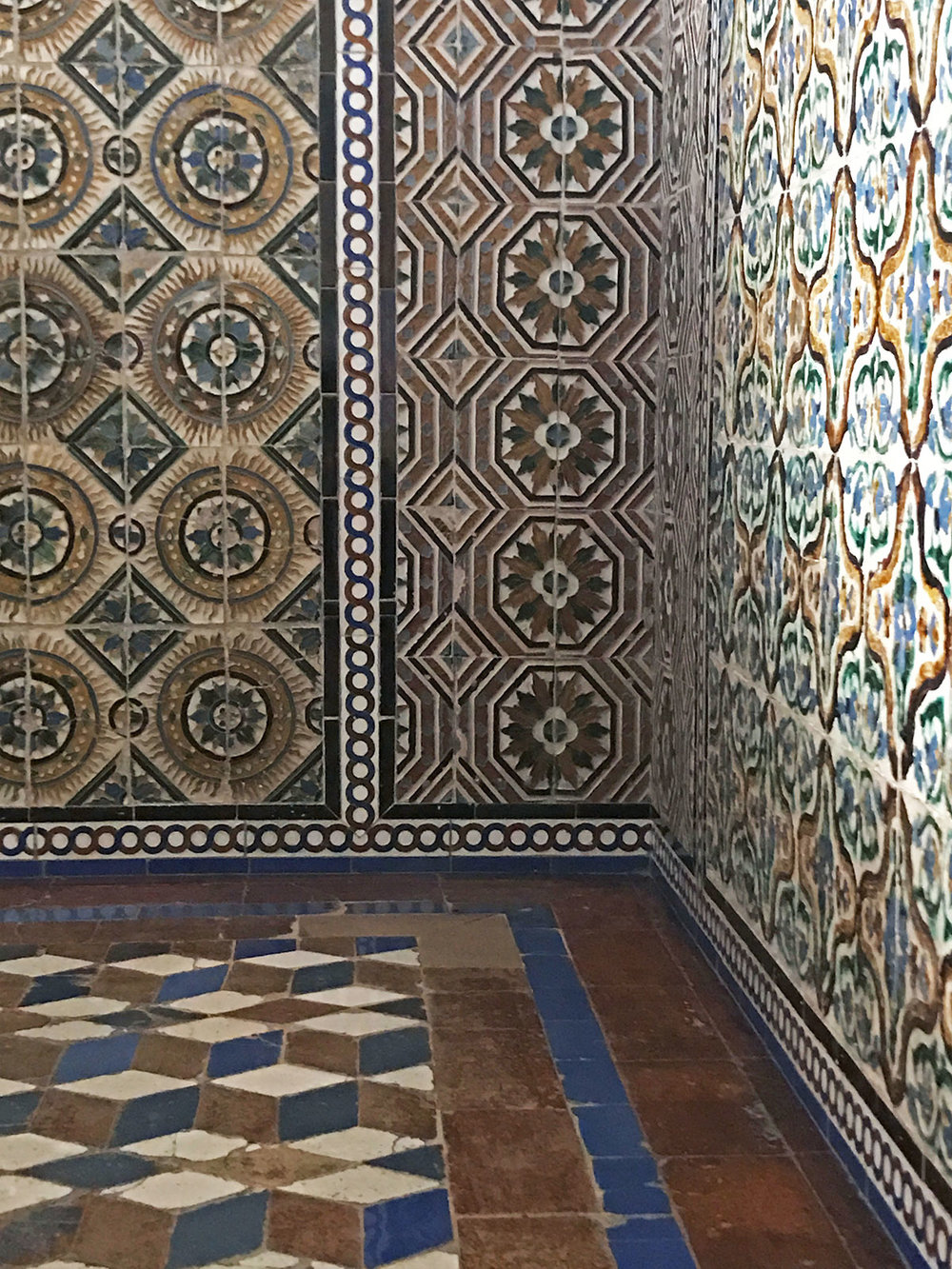 Beautiful, intricate tile work at the Alcázar in Seville, Spain