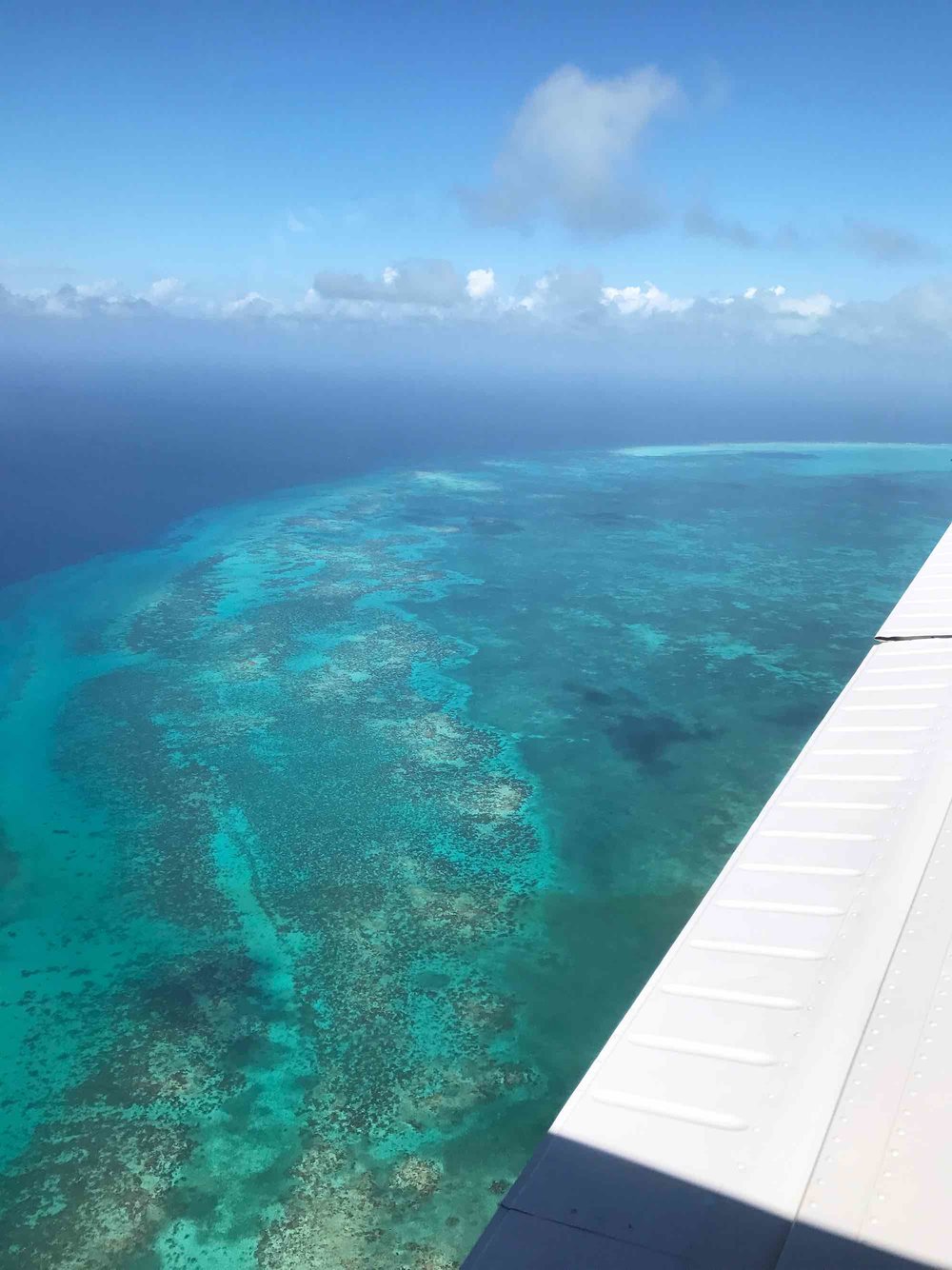 Flying over Belize to the Great Blue Hole
