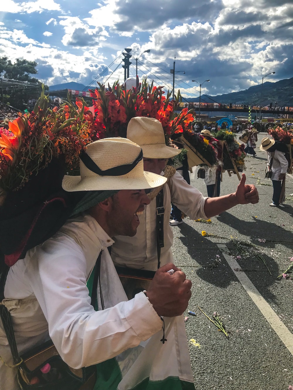 spirited silleteros at the flower festival parade in Medellin